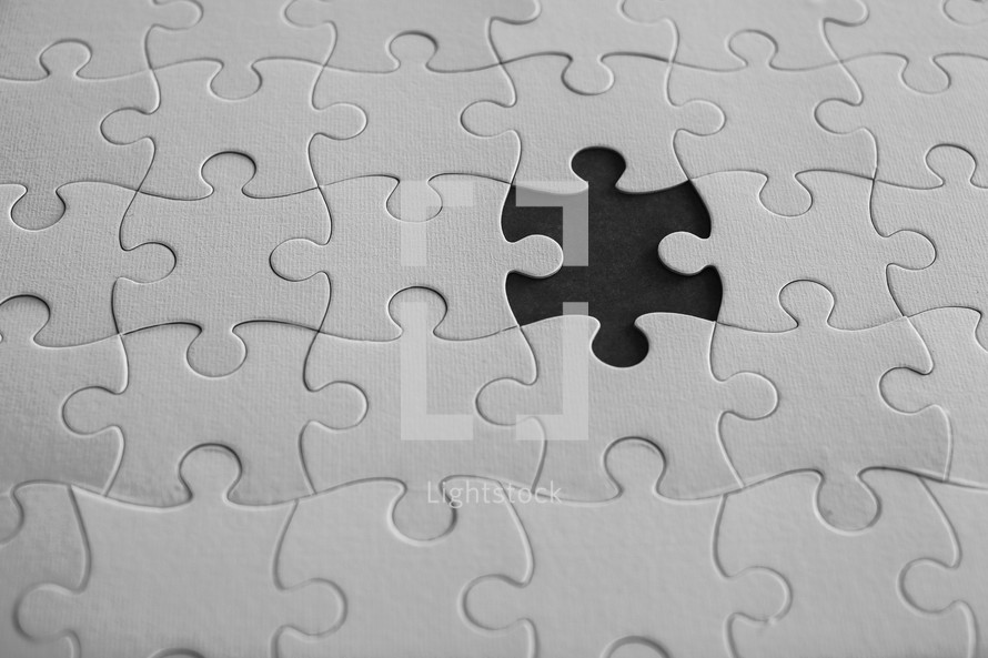 a puzzle with missing pieces 