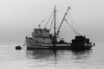 a shrimp boat on the water 