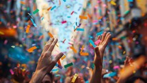 Confetti falling on crowd at music festival