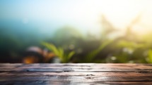 Wooden table top on blurred nature background