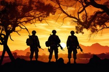 Silhouette of soldiers in the desert at sunset. Military concept