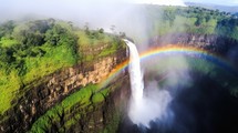 beautiful waterfall with rainbow