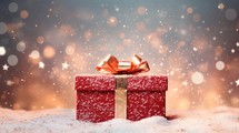 Gift box on snow with bokeh background. Christmas or New Year concept.