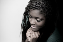 A teen girl in prayer