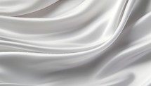 Closeup of rippled white silk fabric cloth.