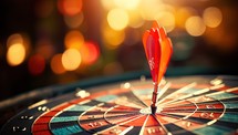 Dartboard with red arrow on the center and bokeh background