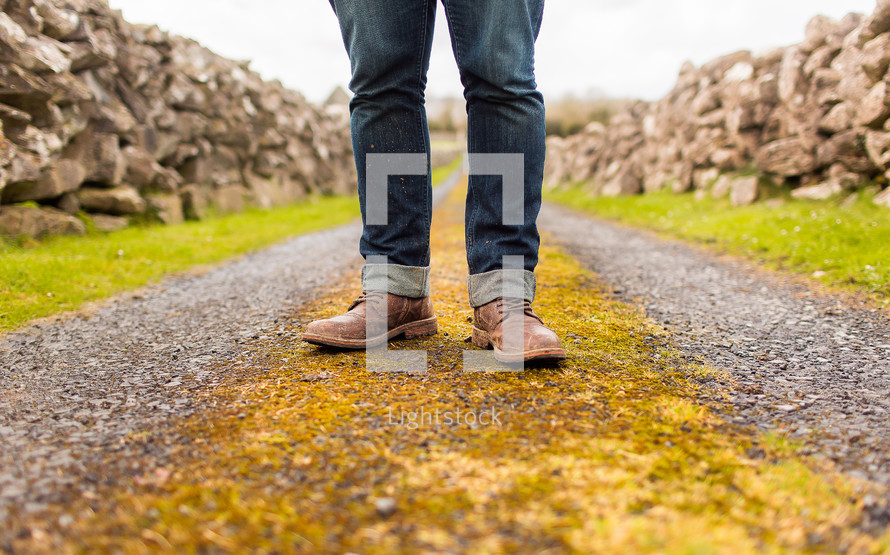 shoes standing on the cliffs of Moher 