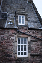 windows on a stone house 