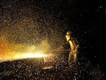 Industrial welder worker in steel plant
