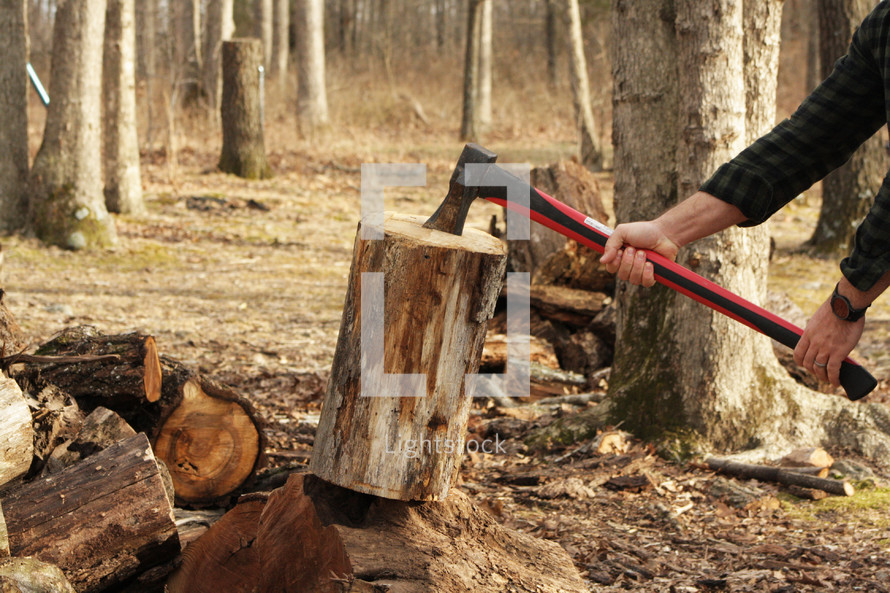chopping wood with an ax 