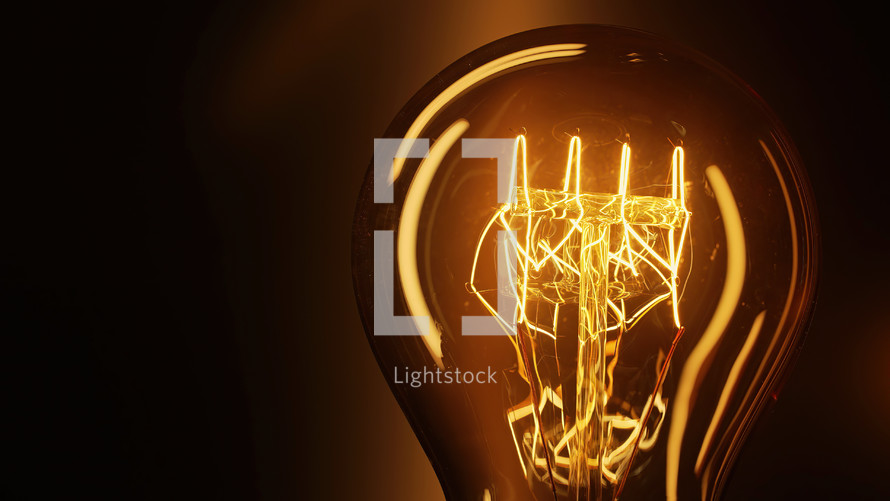 Incandescent Edison Tungsten filament lamp flickering and off, vintage retro bulb. Energy, electricity, innovation. Creative idea, realization, discovery, eureka. Copy space. High quality