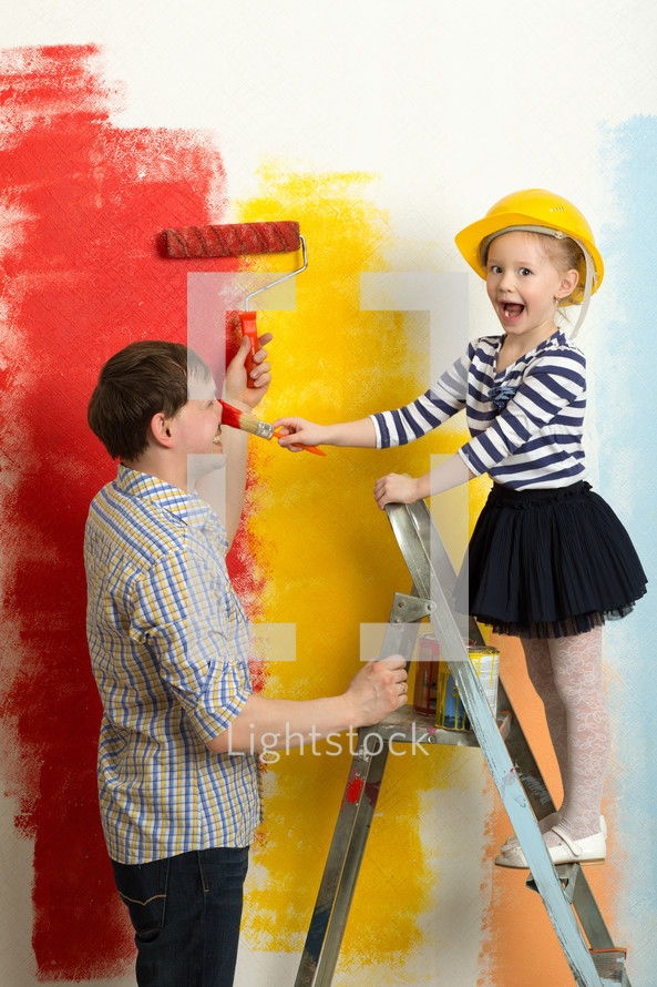 Family fun during wall painting