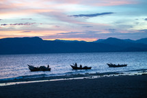 fishing boats at sunset 