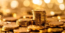 golden coins money background with bokeh light. finance and banking concept.
