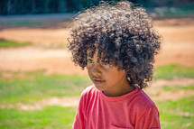 young boy with curly hair 