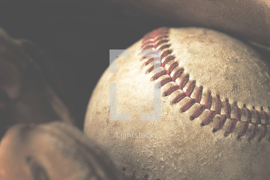 a baseball in a glove 