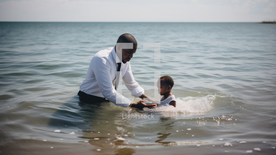Baptism. A black Pastor baptize a little black kid in the water