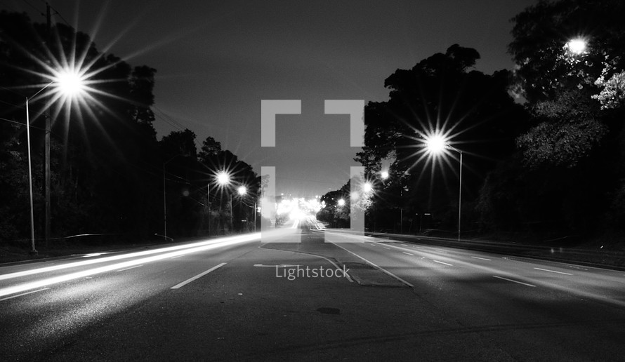 road and streetlights at night 