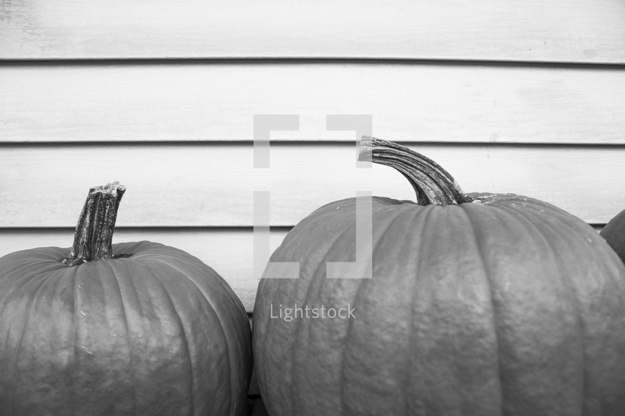 pumpkins on a porch 