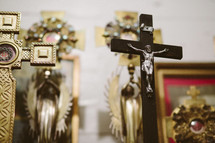 Crucifix with saint relics in a Catholic church.