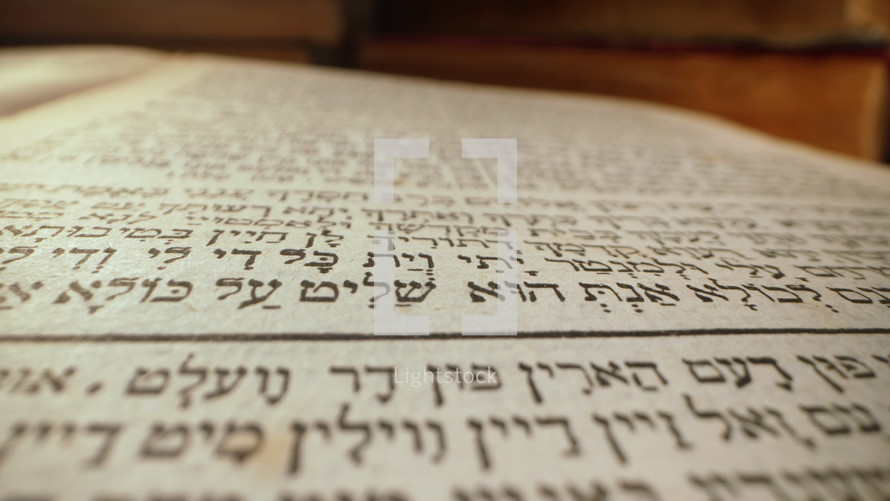 Exploring sacred jewish heritage scriptures on hebrew. Details of the Torah. Tradition and wisdom, macro footage. Letters and symbols. High quality