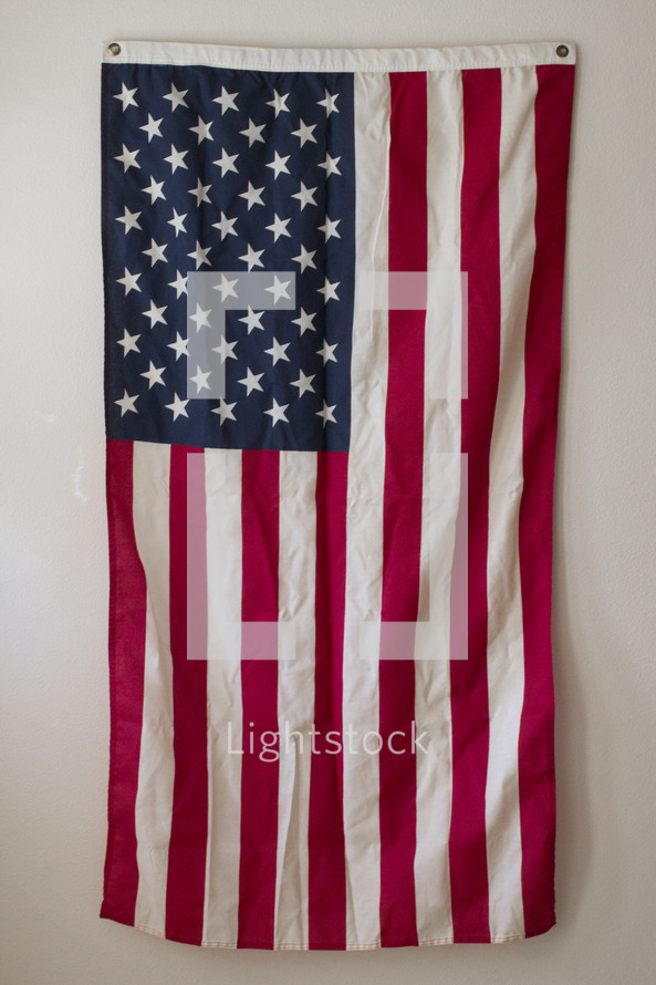 American flag hanging on a wall 