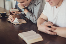 men reading Bible 
