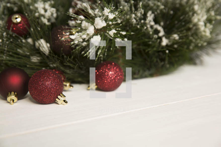 glittery Christmas ornaments and Christmas tree on a white background 