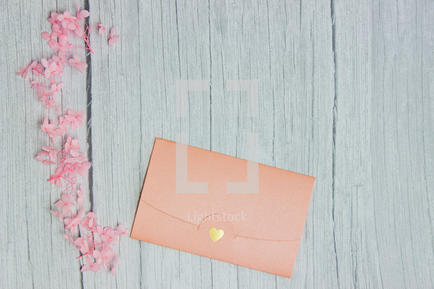 pink flowers and pink envelope 