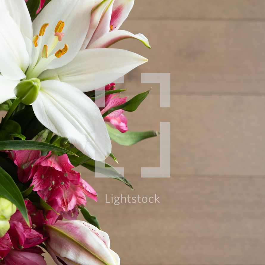 vase of white and pink lilies 