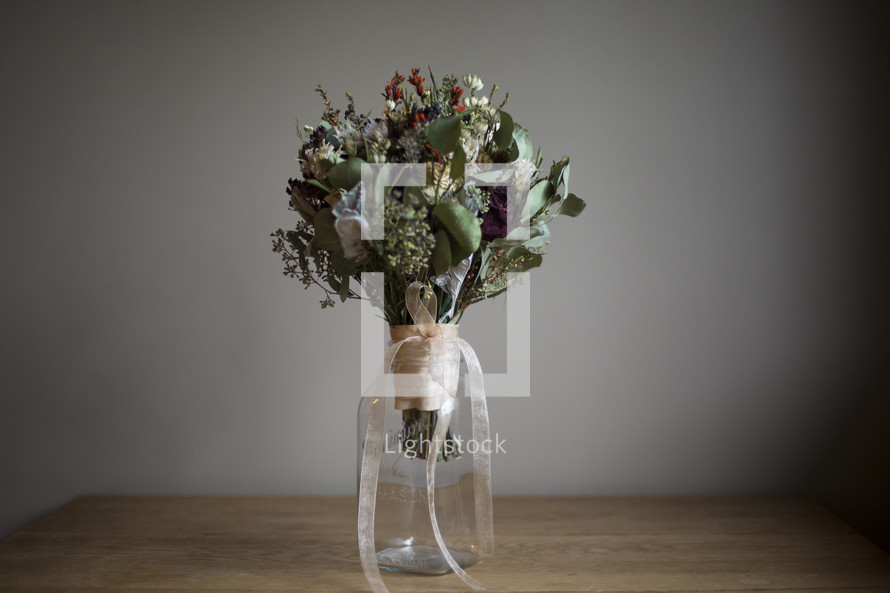 dried flower bouquet in a mason jar 