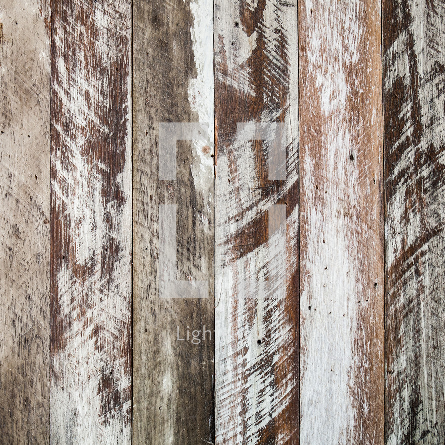 scratched and weathered wood boards background 