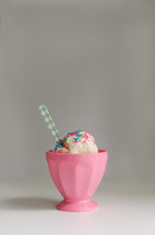 ice cream sundae in a pink cup 