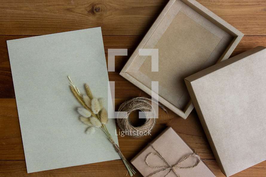 blank paper and empty gift box 