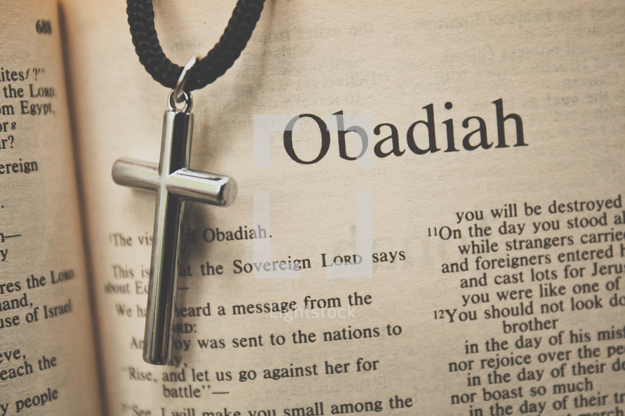Obadiah and a cross necklace 