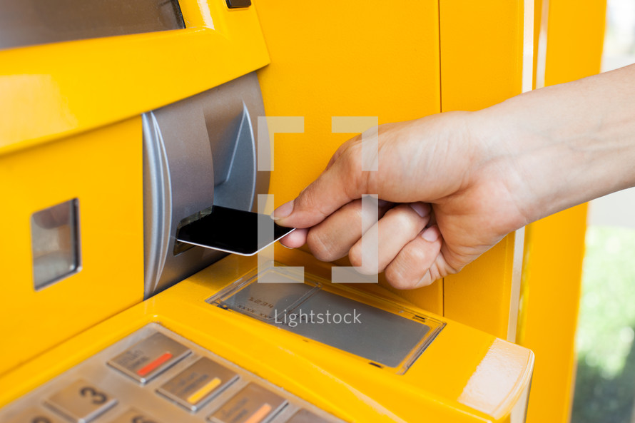 getting money from an ATM machine 