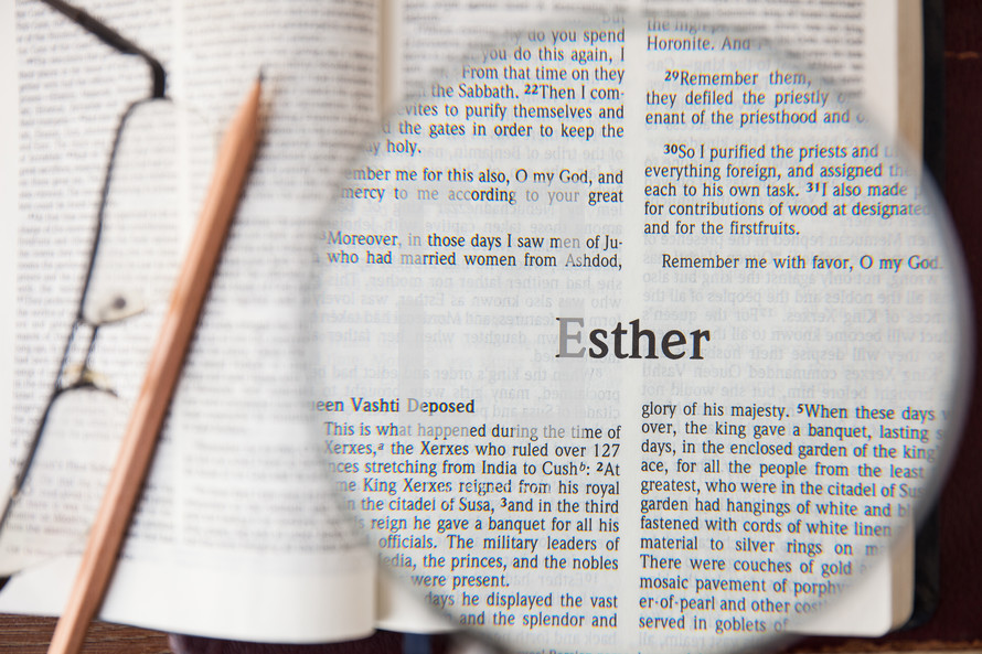 magnifying glass over Esther 