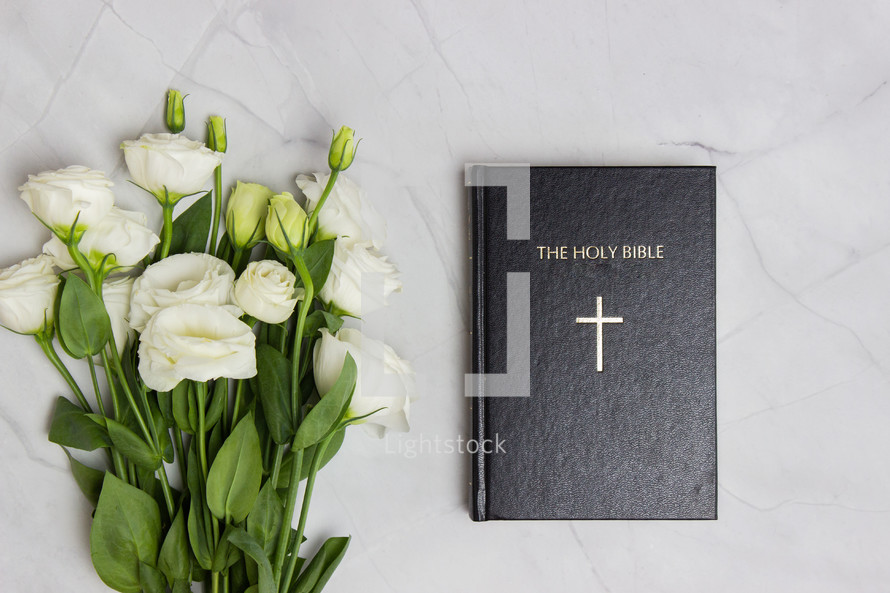 white roses and Bible 