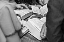 open Bibles being read at a Bible study 