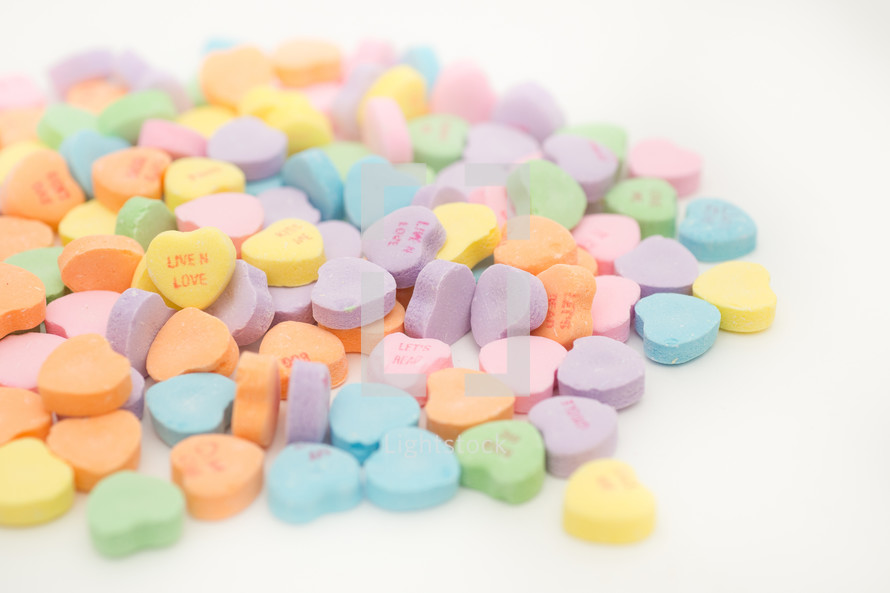 Pile of candy hearts.