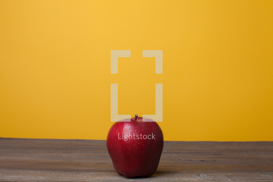 apple on a desk 