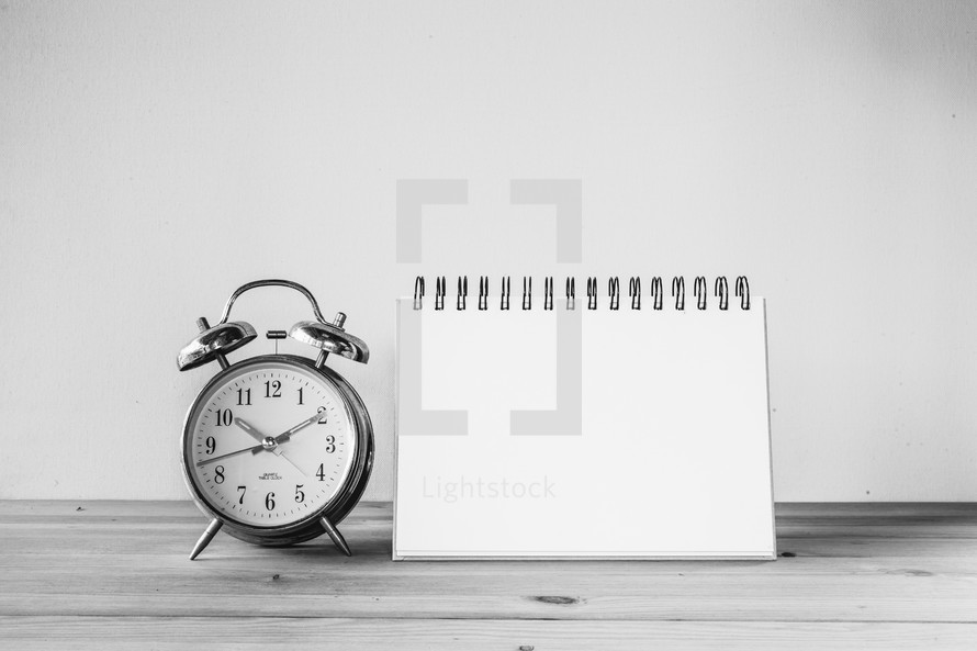 alarm clock and notepad 