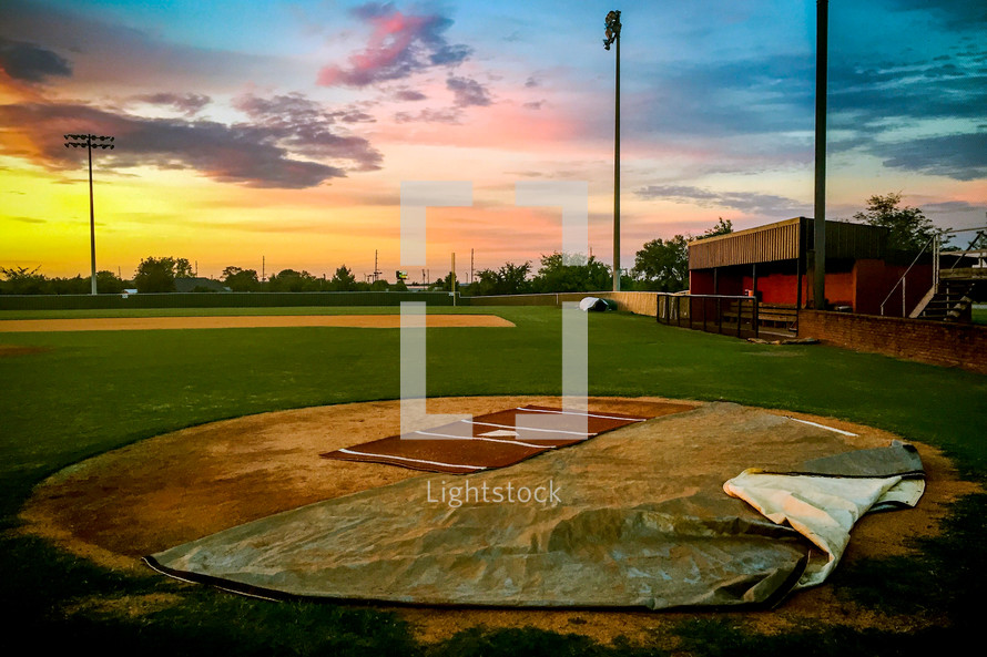 baseball field at sunset 