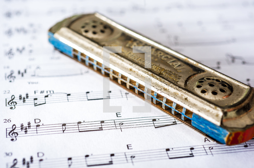 harmonica on sheet music 