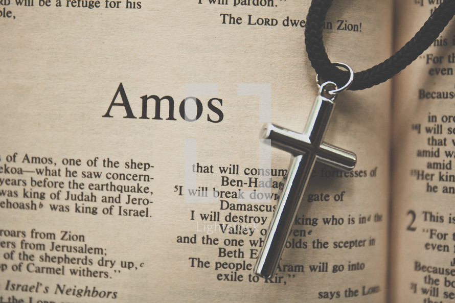 Amos and a cross necklace 