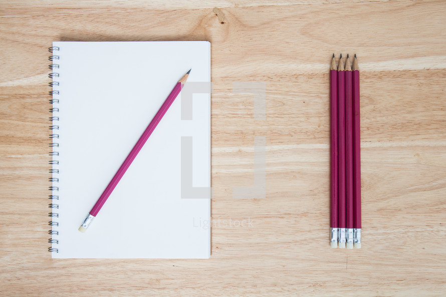 pencils on a sketchbook 