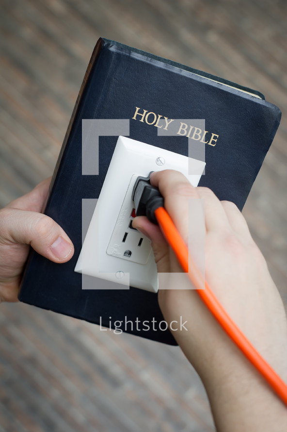 power of scripture - Bible with an outlet and power cord plugged in - get plugged in
