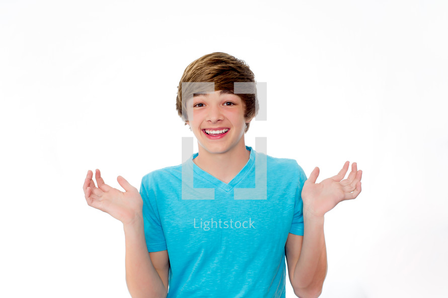 i don't know - teen boy with his palms up