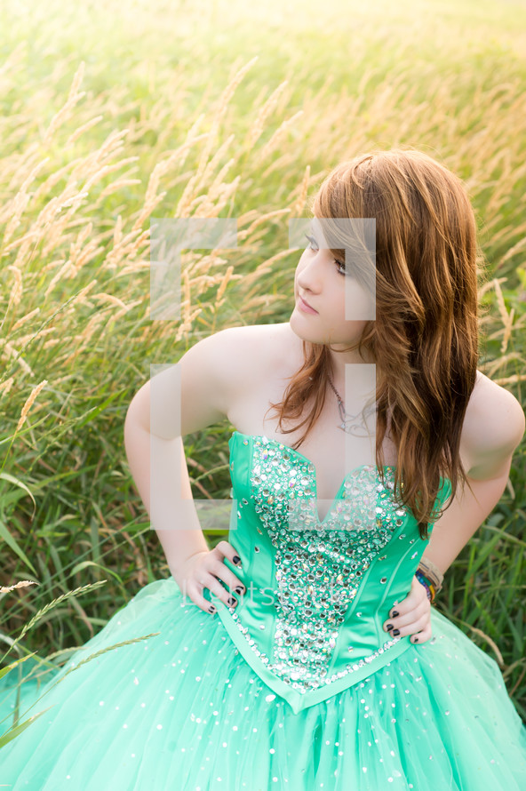 teen girl in a green prom dress