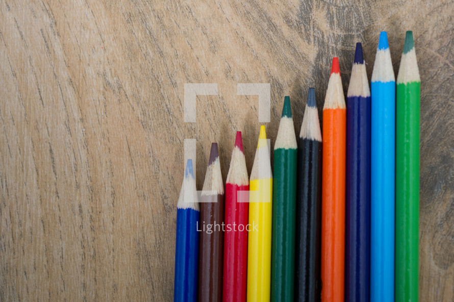 row of colored pencils 